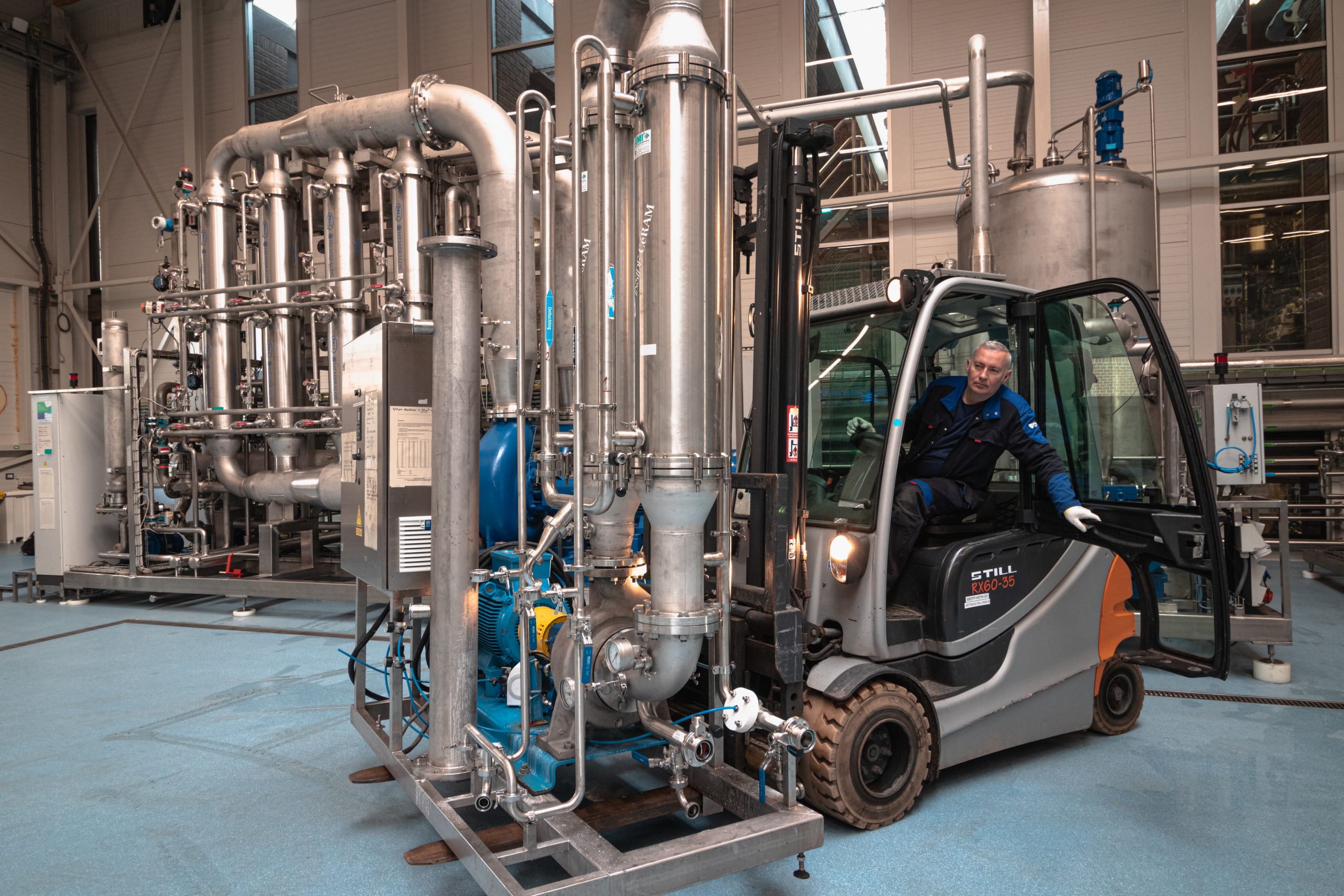 Picture: A technician is moving a ceramic filtration unit using a forklift at the Bio Base Europe Pilot Plant